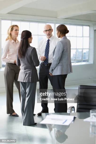 general contractor's team meeting before meeting with architect - senior man grey long hair stock pictures, royalty-free photos & images
