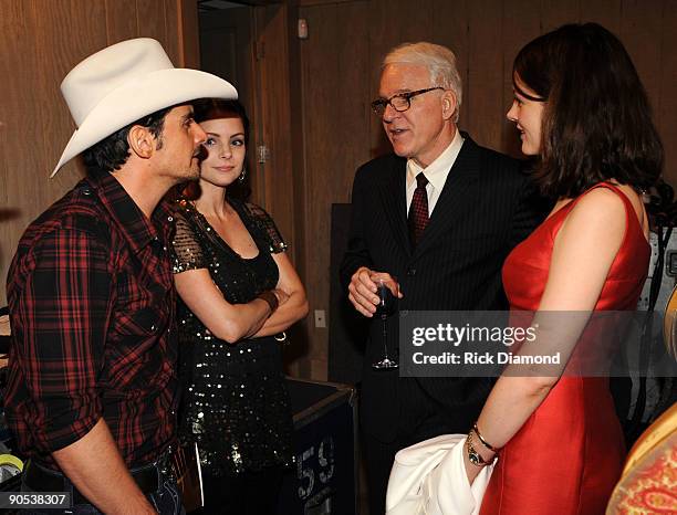 Singer/Songwriter Brad Paisley his wife Actress Kimberlly Williams chat backstage with Comedian/Musician Steve Martin and Wife Anne Stringfield at...