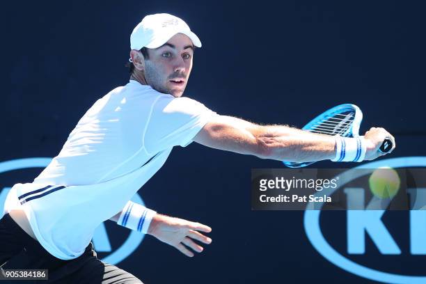 Jordan Thompson of Australia plays a backhand in his first round match against Nicolas Kicker of Argentina on day two of the 2018 Australian Open at...