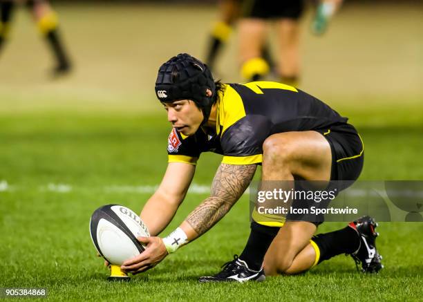 Houston SaberCats fullback Zach Pangelinan sets the ball for an extra point kick during the rugby match between the Vancouver Ravens and Houston...