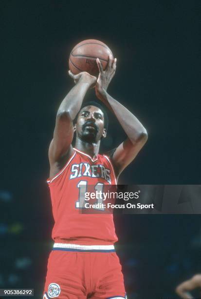 Caldwell Jones of the Philadelphia 76ers shoots a free throw against the Washington Bullets during an NBA basketball game circa 1982 at the Capital...