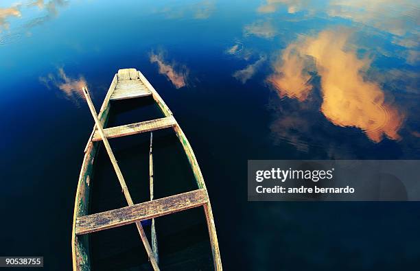 wish we could be rowing above the clouds - garopaba stock pictures, royalty-free photos & images