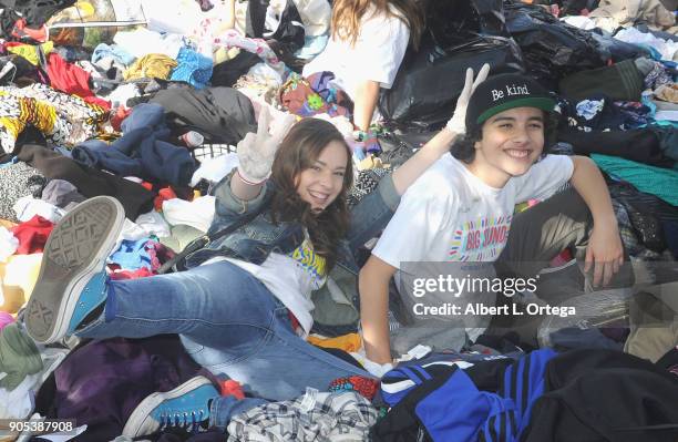 Julianne Collins and Hunter Payton participate in the 6th Annual Martin Luther King Jr. Day Clothing Collection And Community Breakfast held on...