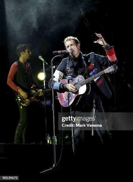 Guy Berryman and Chris Martin of Coldplay perform at the Goffertpark on September 9, 2009 in Nijmegen, Netherlands.