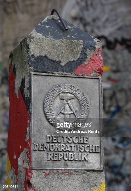 Boundary-post of the German Democratic Republic is seen near Checkpoint Charlie on September 9, 2009 in Berlin, Germany. Allied and Soviet soldiers...