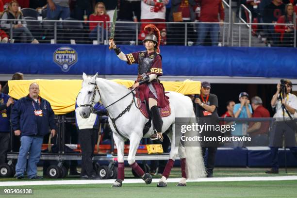 Trojans mascot Traveler IX walks along the sideline during the Cotton Bowl Classic matchup between the USC Trojans and Ohio State Buckeyes on...