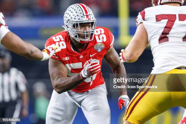 Ohio State Buckeyes defensive end Tyquan Lewis rushes the quarterback during the Cotton Bowl Classic matchup between the USC Trojans and Ohio State...