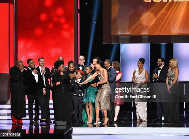 The cast and crew of "black-ish" accept the Outstanding Comedy Series award onstage at the 49th NAACP Image Awards on January 15, 2018 in Pasadena,...
