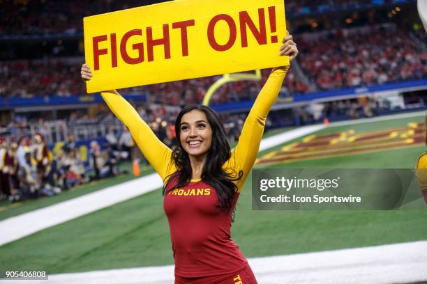 Trojans cheerleader tries to pump up the crowd during the Cotton Bowl Classic matchup between the USC Trojans and Ohio State Buckeyes on December 29...