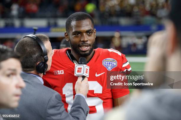 Ohio State Buckeyes quarterback J.T. Barrett is interviewed during the Cotton Bowl Classic matchup between the USC Trojans and Ohio State Buckeyes on...