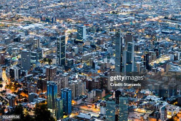 bogota, colombia at night - monserrate bogota stock pictures, royalty-free photos & images