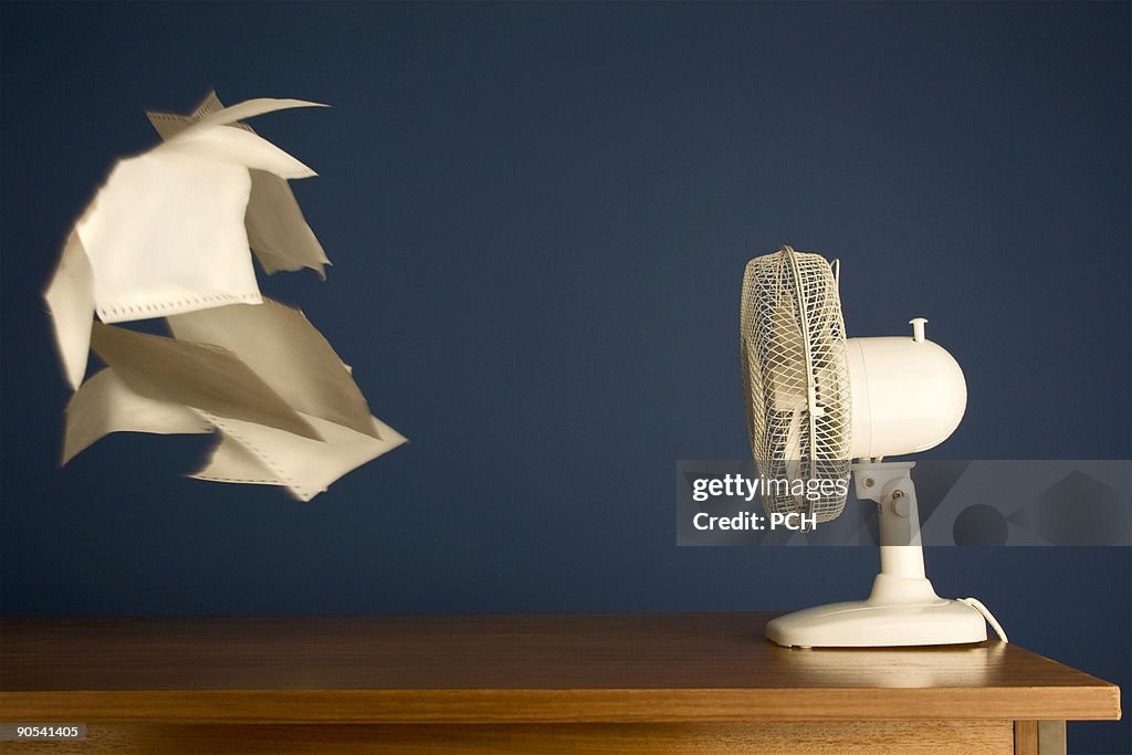 Paper Getting Up Sheets Of Paper Blowing Off The Desk High-Res Stock Photo - Getty Images