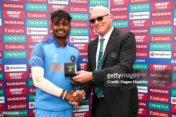 Match referee Jeff Crowe presents Anukul Roy of India with his man of the match medal during the ICC U19 Cricket World Cup match between India and...