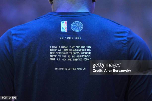 Players wear shirts quoting the "I have a dream" speech by Dr. Martin Luther King Jr. Before a basketball game between the Los Angeles Clippers and...