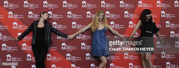 Actresses Anna Bederke, Pheline Roggan and Dorka Gryllus pose during the photocall of "Soul Kitchen" at the Venice film festival on September 10,...