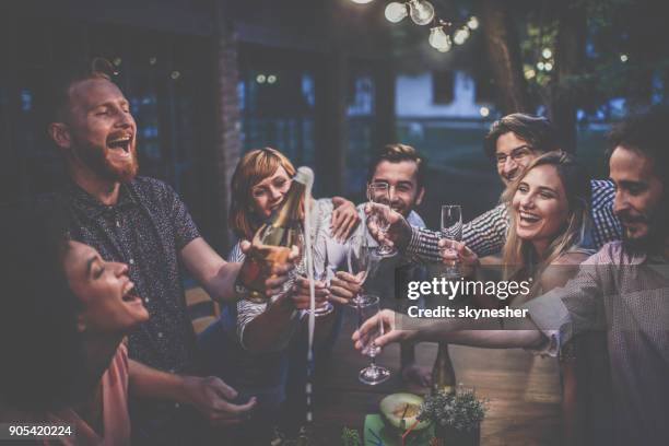 night party with friends and champagne! - spraying champagne stock pictures, royalty-free photos & images