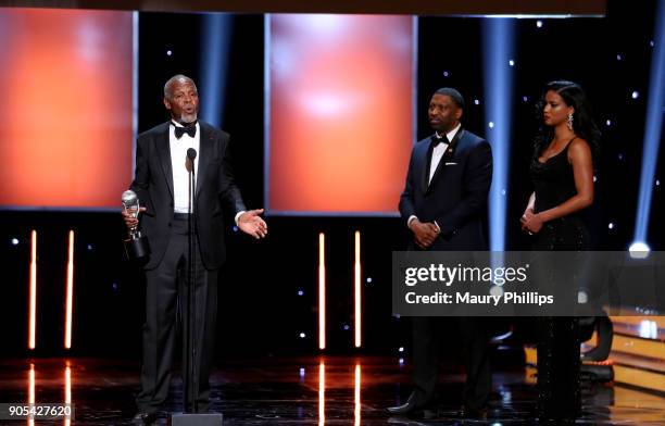 President and CEO of the NAACP Derrick Johnson listens to honoree Danny Glover accept the President's Award onstage during the 49th NAACP Image...