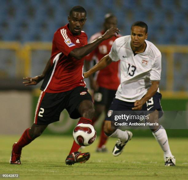 Clyde Leon of Trinidad Tobago fights for the ball with Ricardo Clark of United States during their FIFA 2010 World Cup North, Central America and...