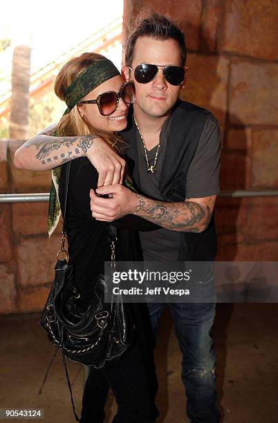 Personality Nicole Richie and musician Joel Madden attend the party for the kids from Beyond Shelter held at Six Flags Magic Mountain on January 3,...