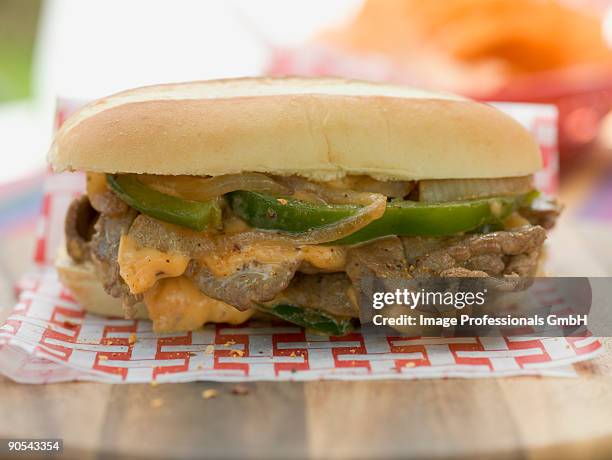 doner sandwich with green peppers, onions and cheese, close up - donker stock pictures, royalty-free photos & images