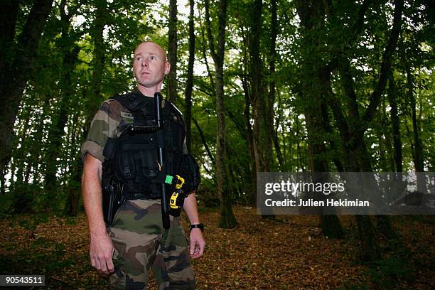 French military police patrol in the forrest of Foret d'Othe in search of the fugitive Jean-Pierre Treiber on September 10, 2009 in Joigny, France....