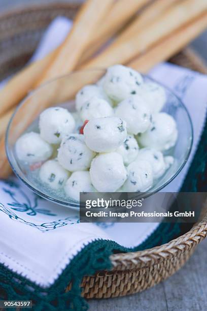 marinated mozzarella balls with grissini, close up - cheese ball stock pictures, royalty-free photos & images