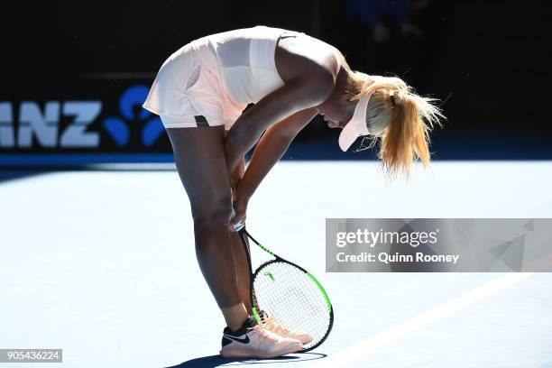 Destanee Aiava of Australia struggles between points in her first round match against Simona Halep of Romania on day two of the 2018 Australian Open...