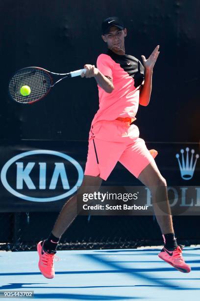 Alexei Popyrin of Australia plays a forehand in his first round match against Tim Smyczek of the United States on day two of the 2018 Australian Open...