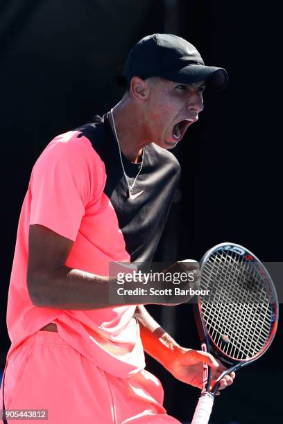 Alexei Popyrin of Australia celebrates winning a point in his first round match against Tim Smyczek of the United States on day two of the 2018...