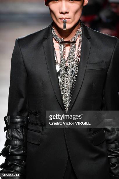 Model walks the runway at the Les Hommes show during Milan Men's Fashion Week Fall/Winter 2018/19 on January 13, 2018 in Milan, Italy.