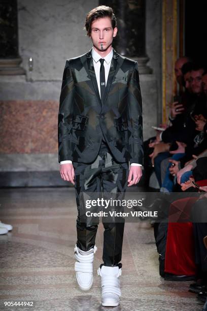 Model walks the runway at the Les Hommes show during Milan Men's Fashion Week Fall/Winter 2018/19 on January 13, 2018 in Milan, Italy.