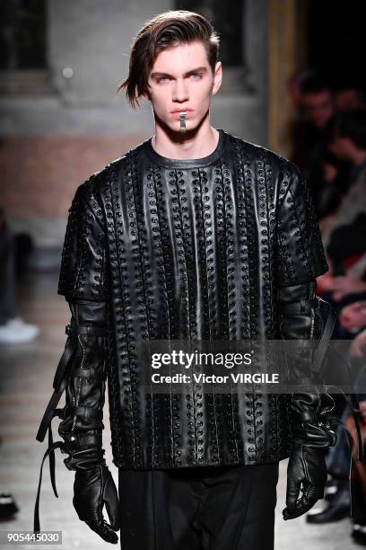 Model walks the runway at the Les Hommes show during Milan Men's Fashion Week Fall/Winter 2018/19 on January 13, 2018 in Milan, Italy.