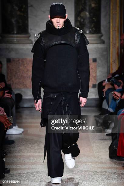 Model walks the runway at the Les Hommes show during Milan Men's Fashion Week Fall/Winter 2018/19 on January 13, 2018 in Milan, Italy.