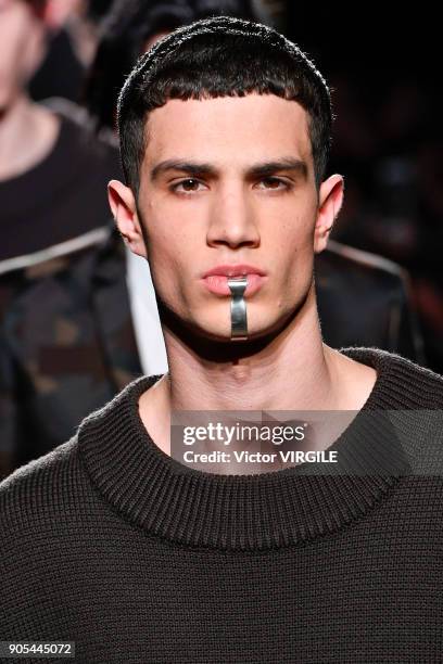 Model walks the runway at the Les Hommes show during Milan Men's Fashion Week Fall/Winter 2018/19 on January 13, 2018 in Milan, Italy.