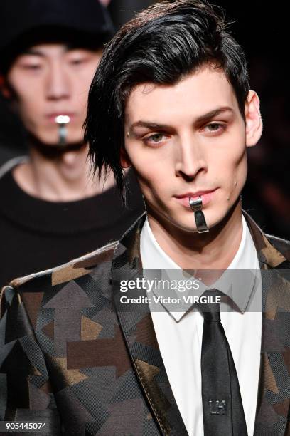 Model walks the runway at the Les Hommes show during Milan Men's Fashion Week Fall/Winter 2018/19 on January 13, 2018 in Milan, Italy.