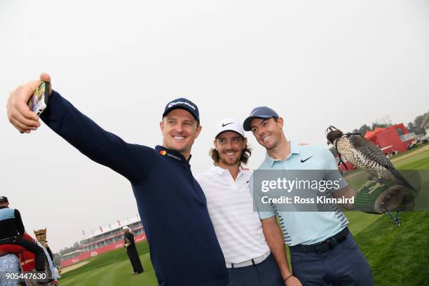 Justin Rose of England, Tommy Fleetwood of England and Rory McIlroy of Northern Ireland take part in a photocall for the Abu Dhabi HSBC Golf...