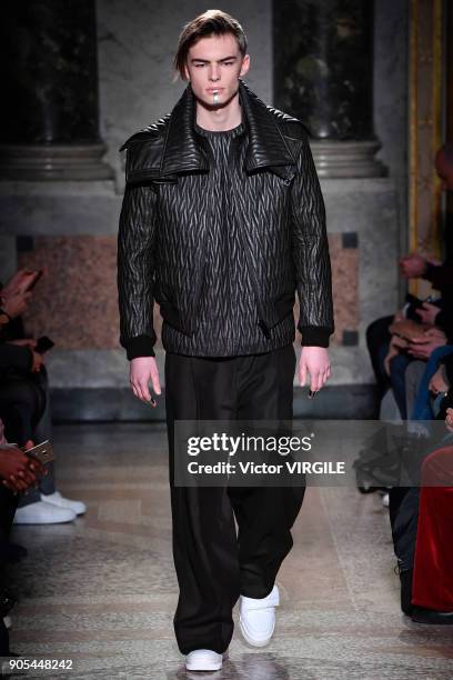 Model walks the runway at the Les Hommes show during Milan Men's Fashion Week Fall/Winter 2018/19 on January 13, 2018 in Milan, Italy.