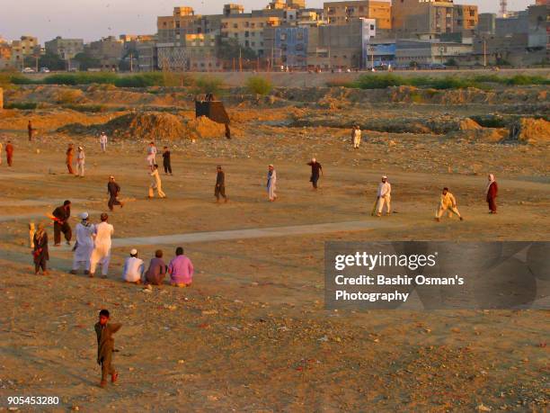 streets of karachi - cricket player silhouette stock pictures, royalty-free photos & images