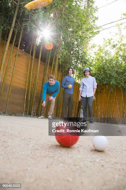 men playing bocce - bocce ball stock pictures, royalty-free photos & images