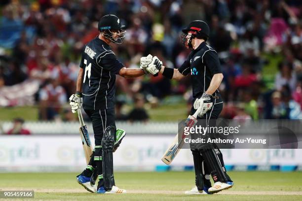 Colin de Grandhomme and Henry Nicholls of New Zealand in their partnership during game four of the One Day International Series between New Zealand...
