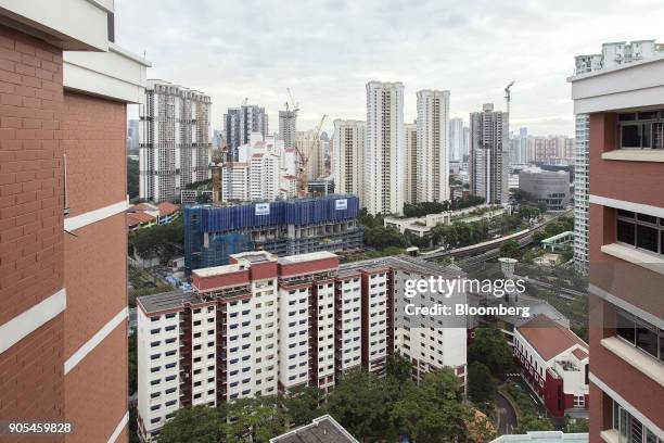 Residential blocks stand in the Queenstown estate in Singapore, on Monday, Jan 15, 2018. Singapore sustained a comeback in home sales in December,...
