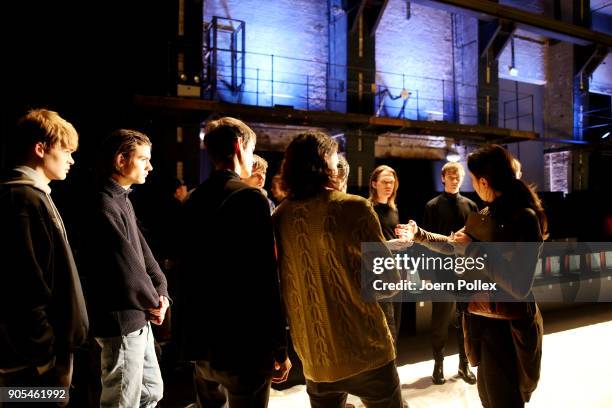 Models get their briefing ahead of the Ivanman show during the MBFW January 2018 at ewerk on January 16, 2018 in Berlin, Germany.