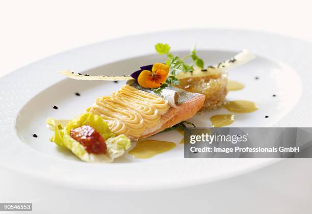 salmon trout with piped potato on plate - sea trout stock pictures, royalty-free photos & images