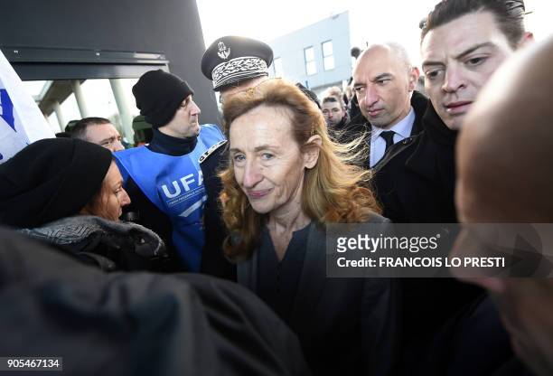 French Justice Minister Nicole Belloubet arrives to visit Vendin-le-Vieil prison on January 16 as French prison guards went on strike after three...