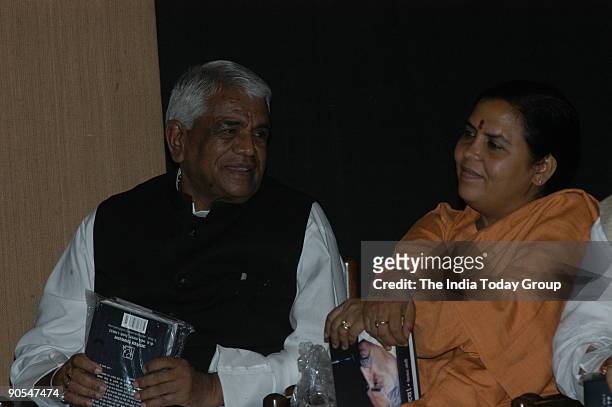 Babulal Gaur, Chief Minister of Madhya Pradesh with Uma Bharti, former Chief Minister of Madhya Pradesh at Kailash Joshi's book release function in...