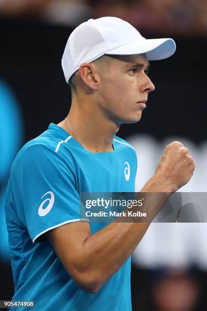 Alex Di Minaur of Australia celebrates winning a point in his first round match against Tomas Berdych of the Czech Republic on day two of the 2018...