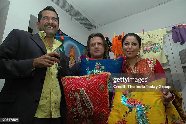 Hotelier AD Singh, designer Rohit Bal and Sabina Singh, wife of AD Singh, at Over-the-top party in Defence Colony, New Delhi.