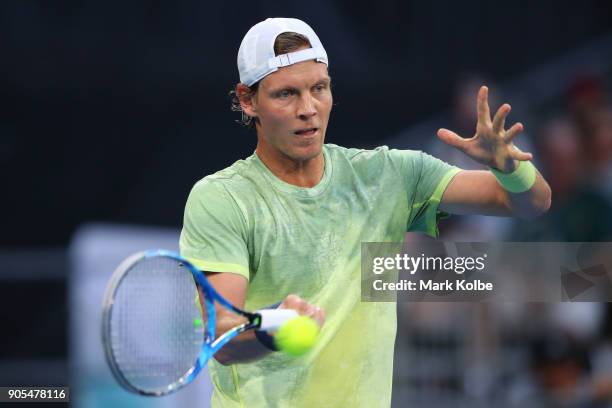 Tomas Berdych of the Czech Republic plays a forehand in his first round match against Alex Di Minaur of Australia on day two of the 2018 Australian...