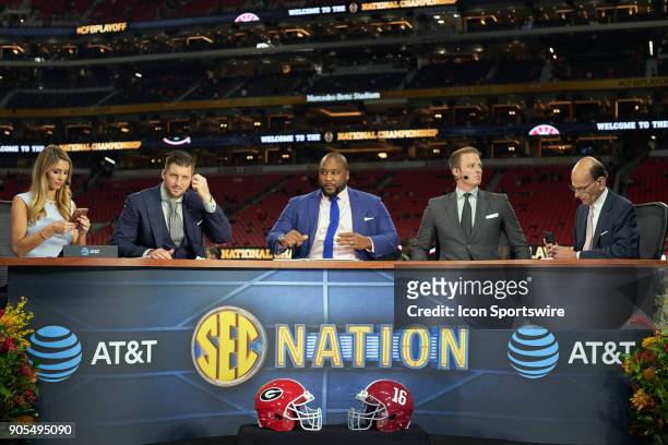 Commentators and analysts Laura Rutledge, Tim Tebow, Booger McFarland, Greg McElroy and Paul Finebaum are seen on the SEC Nation broadcast setup...