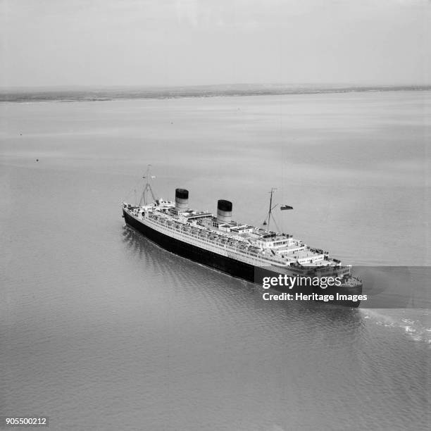 Queen Elizabeth' in the Solent approaching Southampton Water, Hampshire, 1949. Artist Aerofilms.